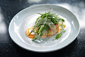 Crab Cake Dinner Recipe: Savor the Delight of Succulent Crab Cakes, Served with a Refreshing Rocket Salad