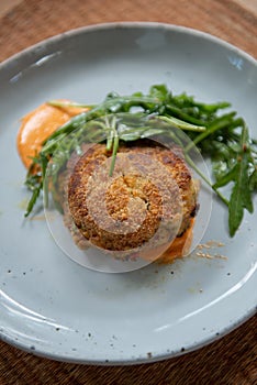 Crab Cake Dinner Recipe: Savor the Delight of Succulent Crab Cakes, Served with a Refreshing Rocket Salad