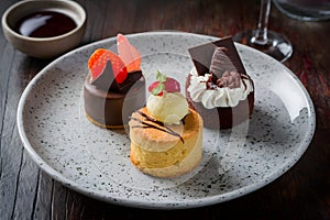 Indulgent bite sized desserts, featuring exquisite chocolate and cake trio