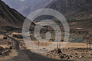 Indus river flowing through mountains in Ladakh, India photo