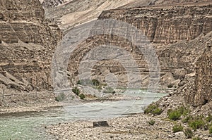 Indus river flowing through mountains in Ladakh photo