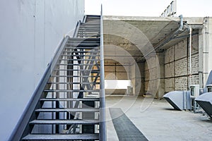 Industial steel stair at the rooftop building