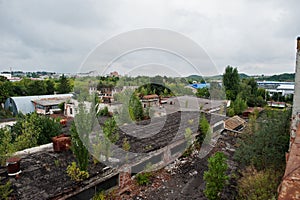 Industria exterior of an roof old abandoned factory photo