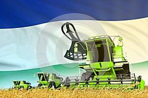 industrial 3D illustration of green wheat agricultural combine harvester on field with Lesotho flag background, food industry