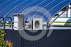 Industrial air conditioning and ventilation system on the roof of the building.