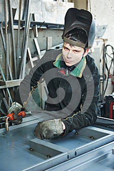Industrial arc welding worker