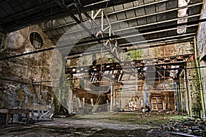 industrial archaeology, old abandoned and collapsed factory photo
