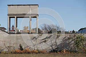 Industrial archeology buildings in the city of Busto Arsizio. Rectangular water tank with reinforced concrete pillars photo