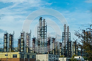 Industrial area. Old refinery. Rusty furnaces and basins