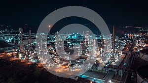 industrial area production plant or refinery crude oil and gas for transportatioon and export, aerial photography at night scene