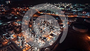 industrial area production plant or refinery crude oil and gas for transportatioon and export, aerial photography at night scene