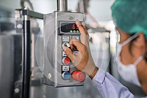 Industrial background of hand operating control panel in factory