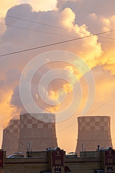 Industrial background image of TPP with copy space. Huge pipes of thermal power plant. vertical photo