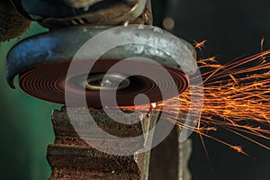 Industrial background, industry, Sparks from grinding machine in