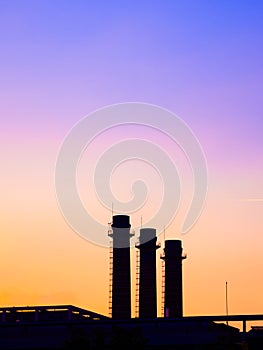 Industrial background at sunset