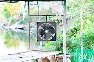 Industrial building exhaust fan old. For ventilation in factories, offices.