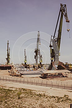 Industrial building at the Gdansk Shipyard, former Lenin Shipyard, prefabrication workshop and heavy cranes large Polish