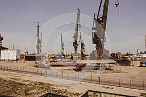 Industrial building at the Gdansk Shipyard, former Lenin Shipyard, prefabrication workshop and heavy cranes large Polish