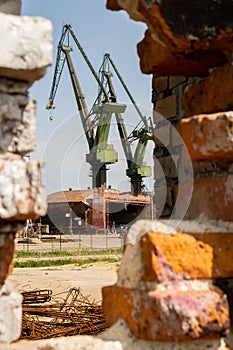 Industrial building at the Gdansk Shipyard, former Lenin Shipyard, prefabrication workshop and heavy cranes large Polish