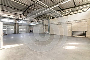 Industrial building or modern factory for manufacturing production plant or large warehouse