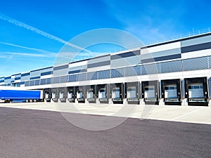 Industrial building and warehouse with trucks