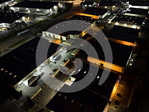 Industrial Business Park Warehouse Buildings At Night Aerial View