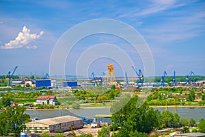 Industrial cargo port skyline, loading cranes