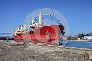 Industrial cargo ship sailing down the Welland Canal.