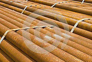 Industrial cargo for shipment: rusty pipes