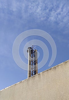 Industrial chimney equipped with bird spikes