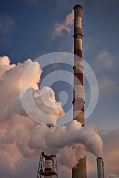 Industrial chimney for population heating during wintertime