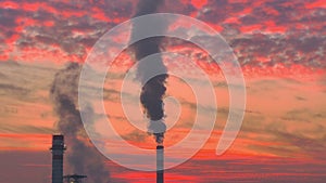 Industrial chimney smoke factory at sunset 4