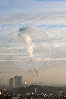 Industrial chimneys bellowing out smoke