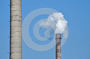 Industrial chimneys with smoke