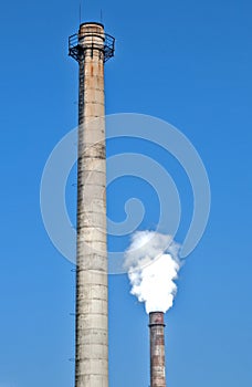 Industrial chimneys with smoke