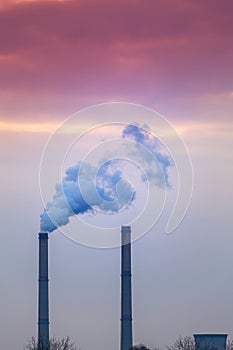 Industrial cityscape with coal power plant and smoke stacks