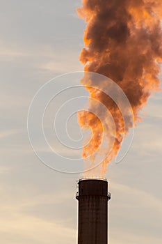 Industrial cityscape with smoke from coal powered plant