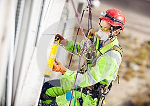 Industrial climber during winterization works