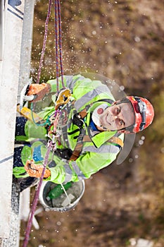 Industrial climber during winterization works photo