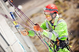 Industrial climber during winterization works photo