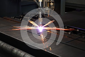 Industrial cnc plasma cutting of metal plate