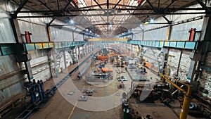 Industrial concept. A view from the bridge on construction site inside the manufacturing plate