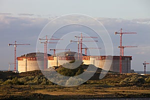 Industrial cranes and storage tanks