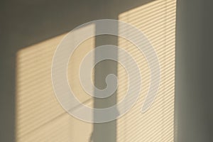 Industrial design window sunlight parallel lines shadows. Light and shadow from the window. Thin lines of light on the