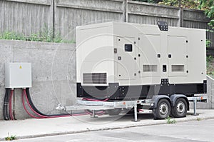 Industrial Diesel Generator. Standby generator. Industrial Diesel Generator for Office Building connected to the Control Panel photo