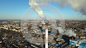 Industrial emissions of smoke from factory pipes in indistrial zone