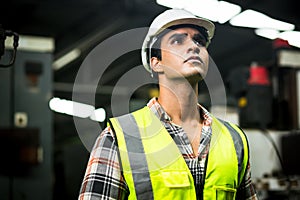 Industrial engineer in hard Hat wearing safety .