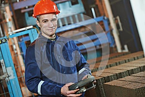 Industrial engineer worker at control panel photo