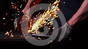 Industrial engineer working on cutting a metal and steel with compound mitre saw with sharp, circular blade