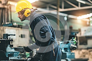 Industrial Engineers in Hard Hats.Work at the Heavy Industry Manufacturing Factory.industrial worker indoors in factory. man